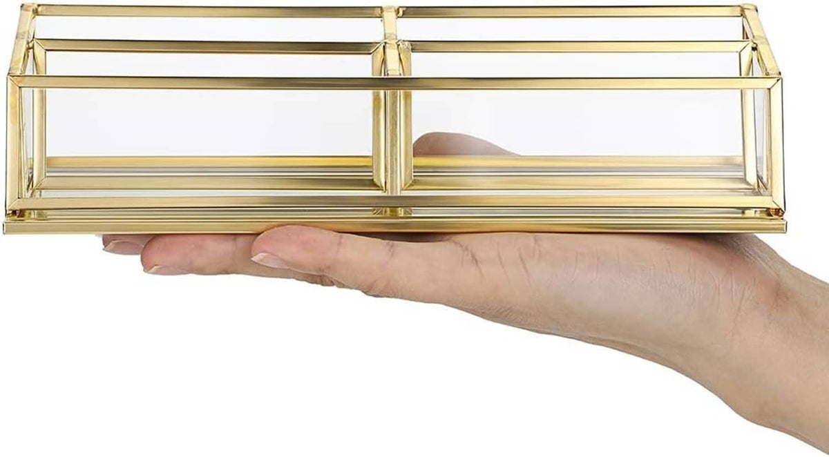 Gold 4-slot business card holder with clear glass front, held in a hand