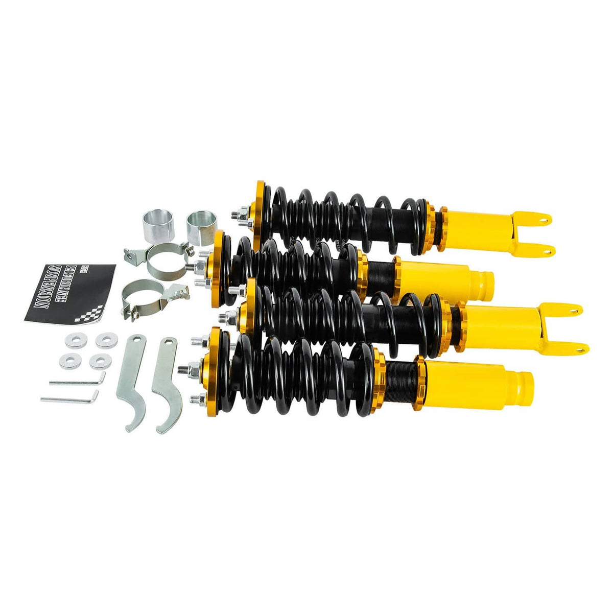 Four-piece coilover set with black springs, yellow dampers, and included installation parts