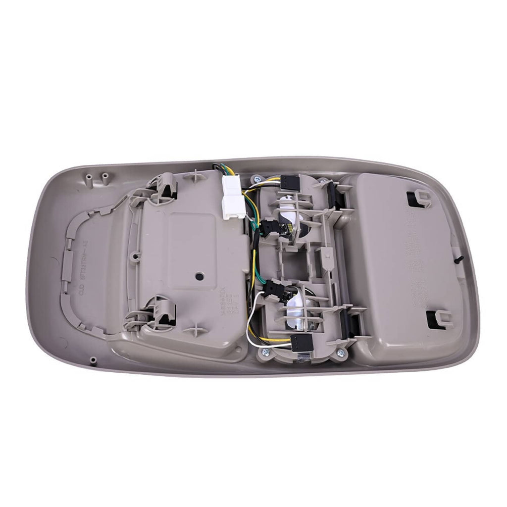 Vehicle overhead console cover opened to reveal internal wiring and mounting hardware, light gray.