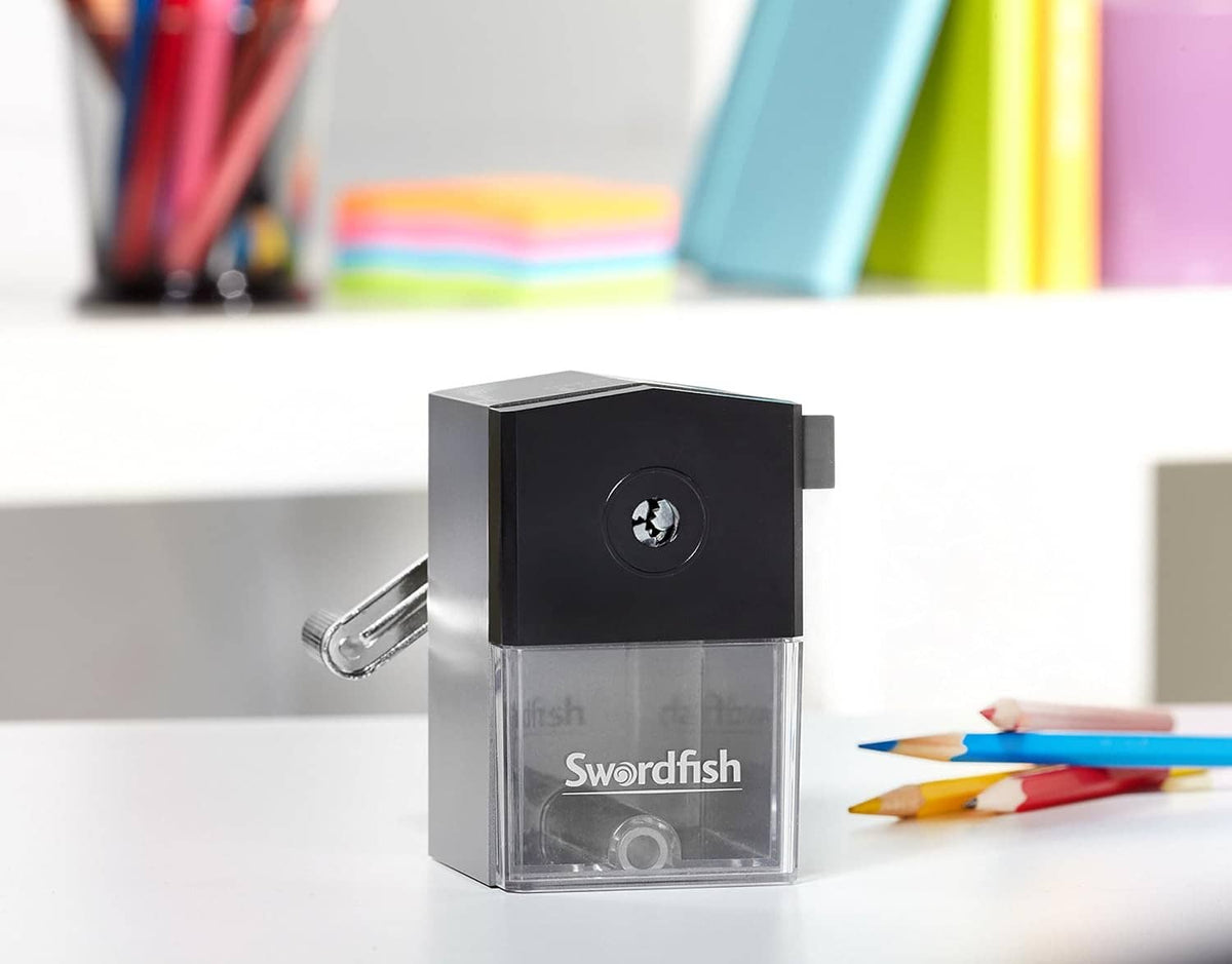 Compact black desk pencil sharpener with side crank and clear collection container