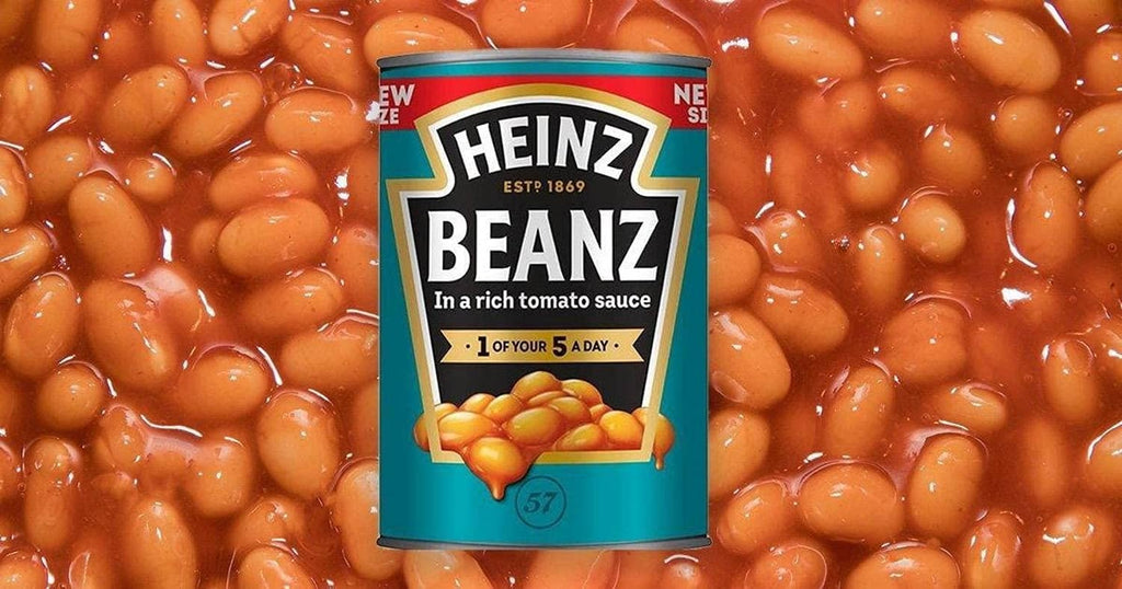 Heinz Beanz baked beans can in rich tomato sauce with visible bean texture