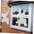 White Halloween stuffed ghost window decorations, pair with big black eyes and long tails