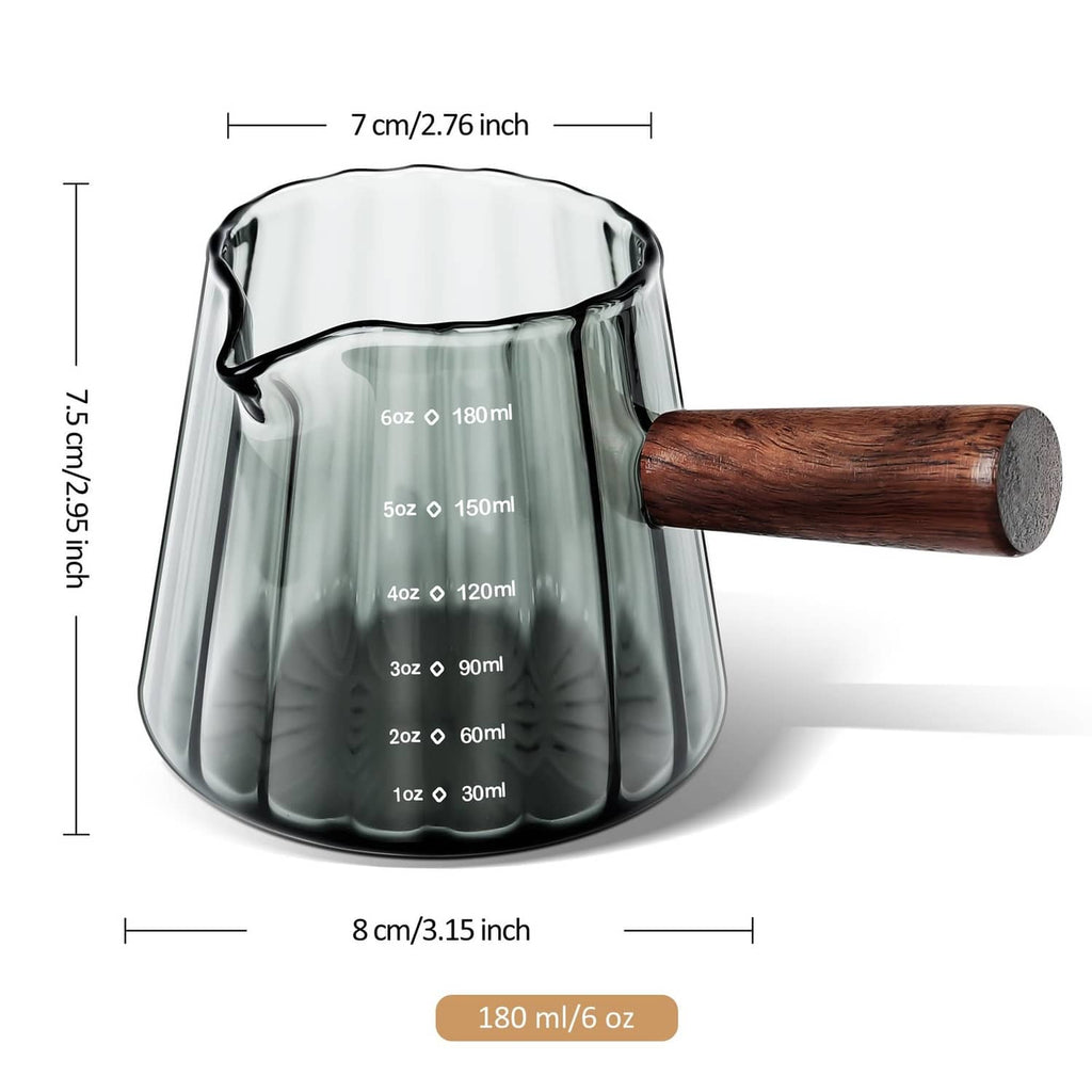 Clear single-spout measuring cup with wood handle, ml scale and capacity label (180 ml)