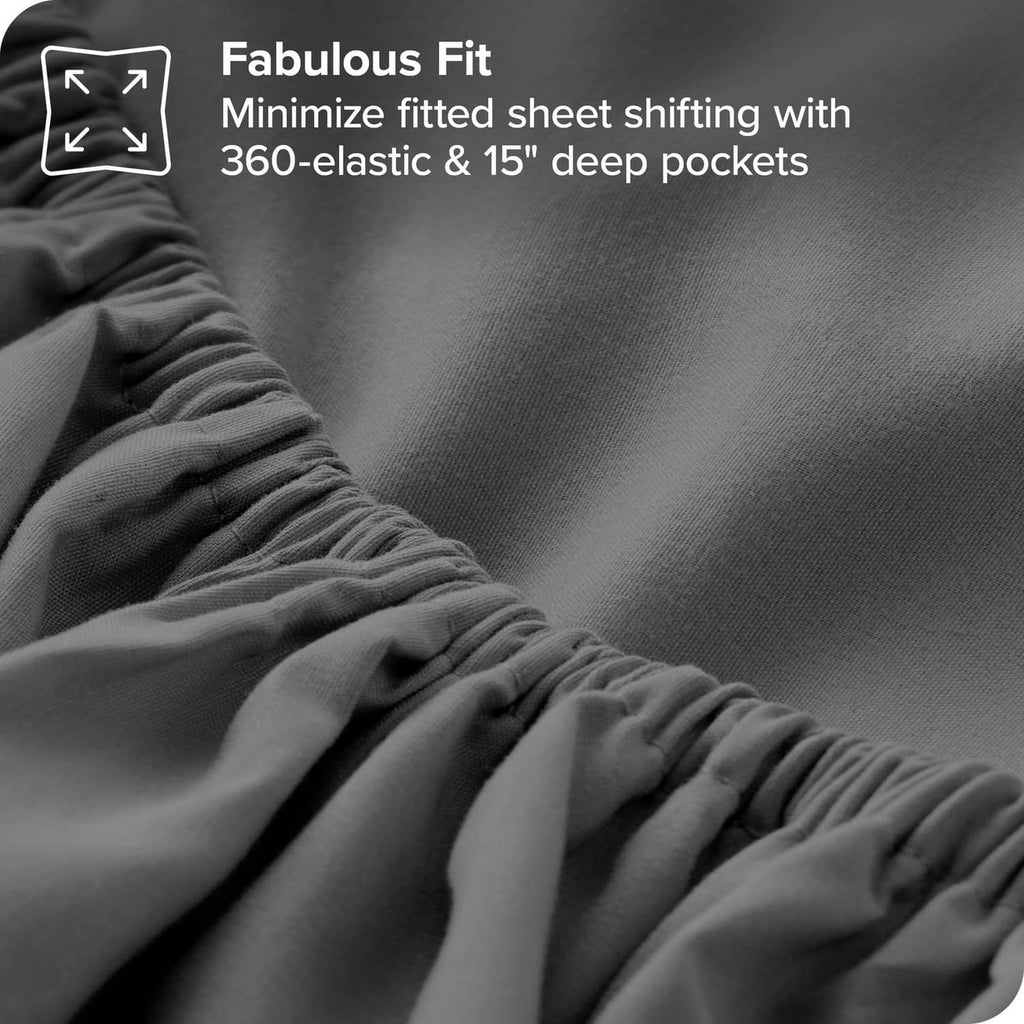 Grey fitted sheet with elastic edge and gathers for a snug, shifting-minimizing fit