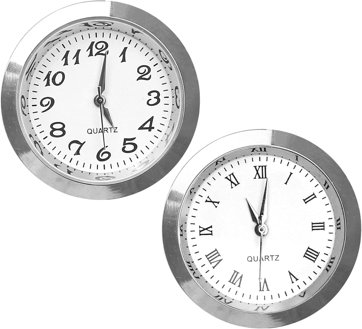 Two small round clock face inserts with silver bezel, white dial, black Roman numerals