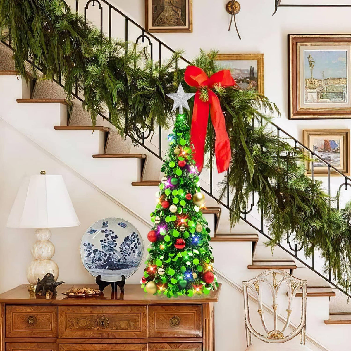 3ft lit tinsel Christmas tree with silver star topper, green foliage, colorful ornament balls