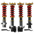 Coilover strut shock absorber set, four units with red springs and gold tops