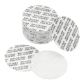 White 35mm foam lid liner discs, stacked and loose for sealing