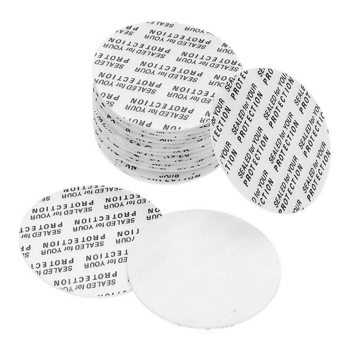 White 35mm foam lid liner discs, stacked and loose for sealing