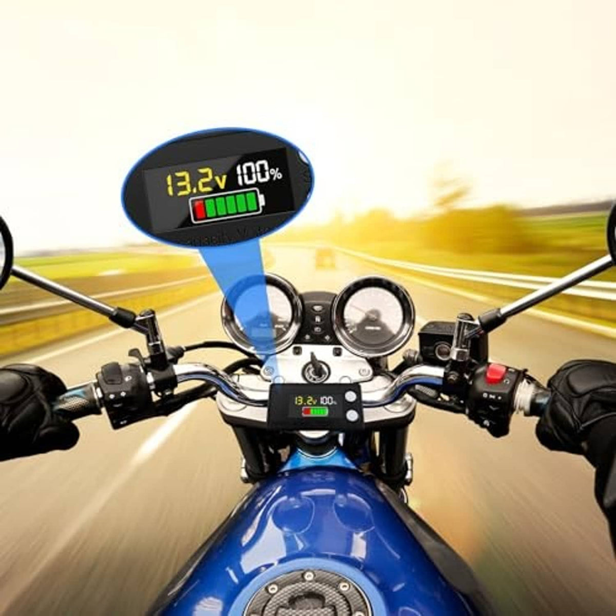 Battery monitor display on motorcycle handlebar, LCD shows 13.2V and 100%