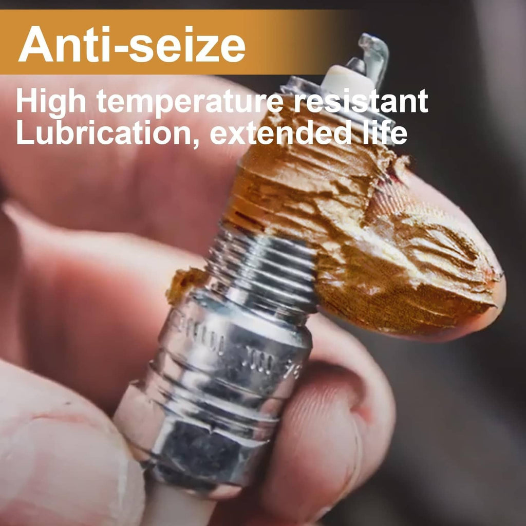 Copper anti-seize paste on spark plug threads on a hand-held plug