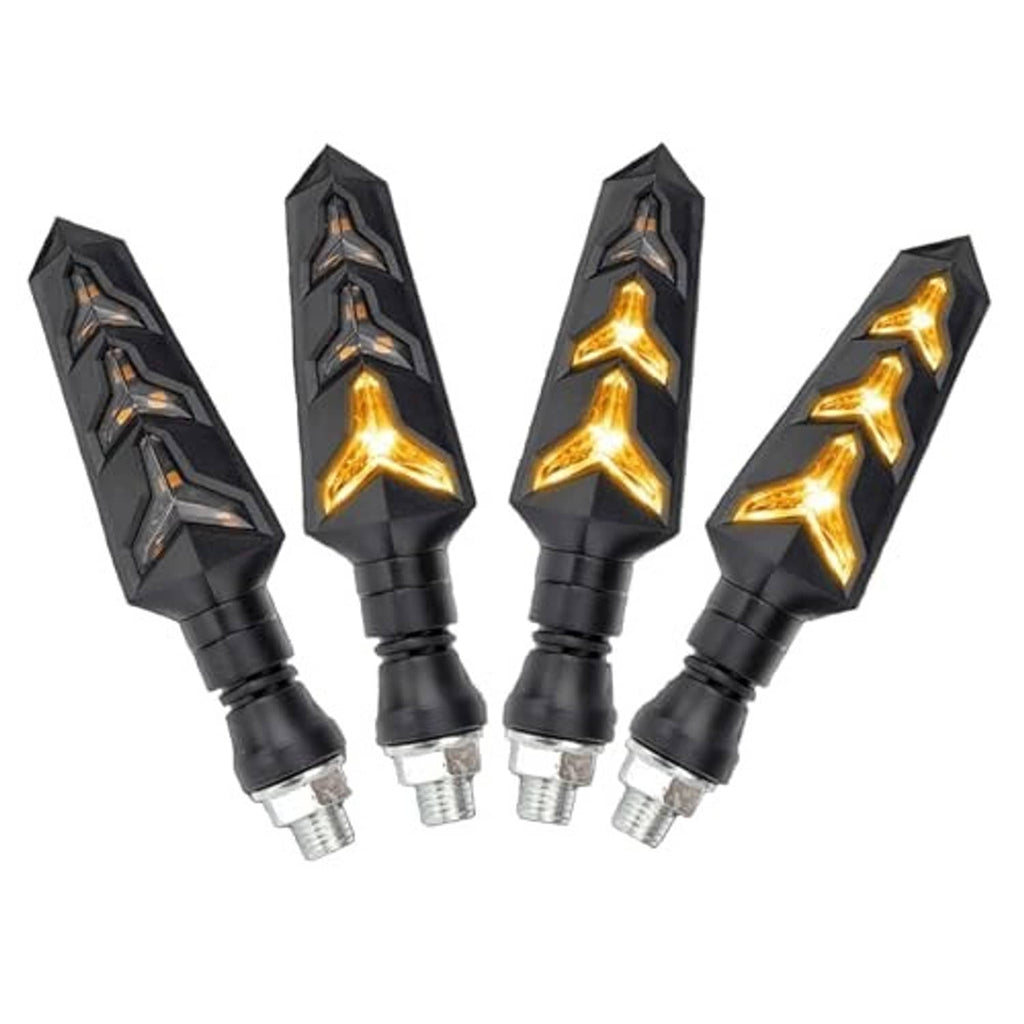 Four black Y-shape LED motorcycle turn signal bulbs with amber flowing arrows, angled view