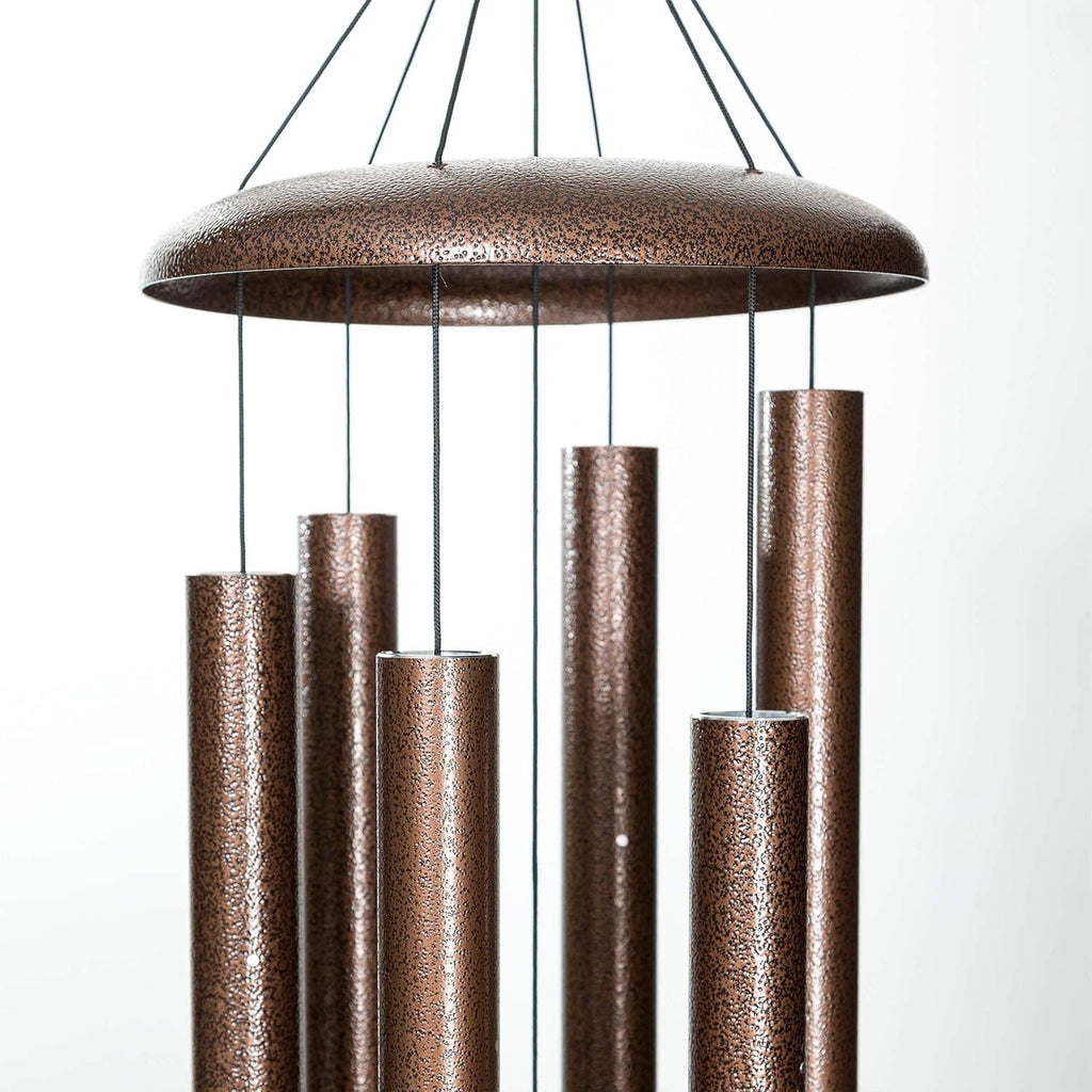 Copper-toned wind chime top dome with hanging rods and central support