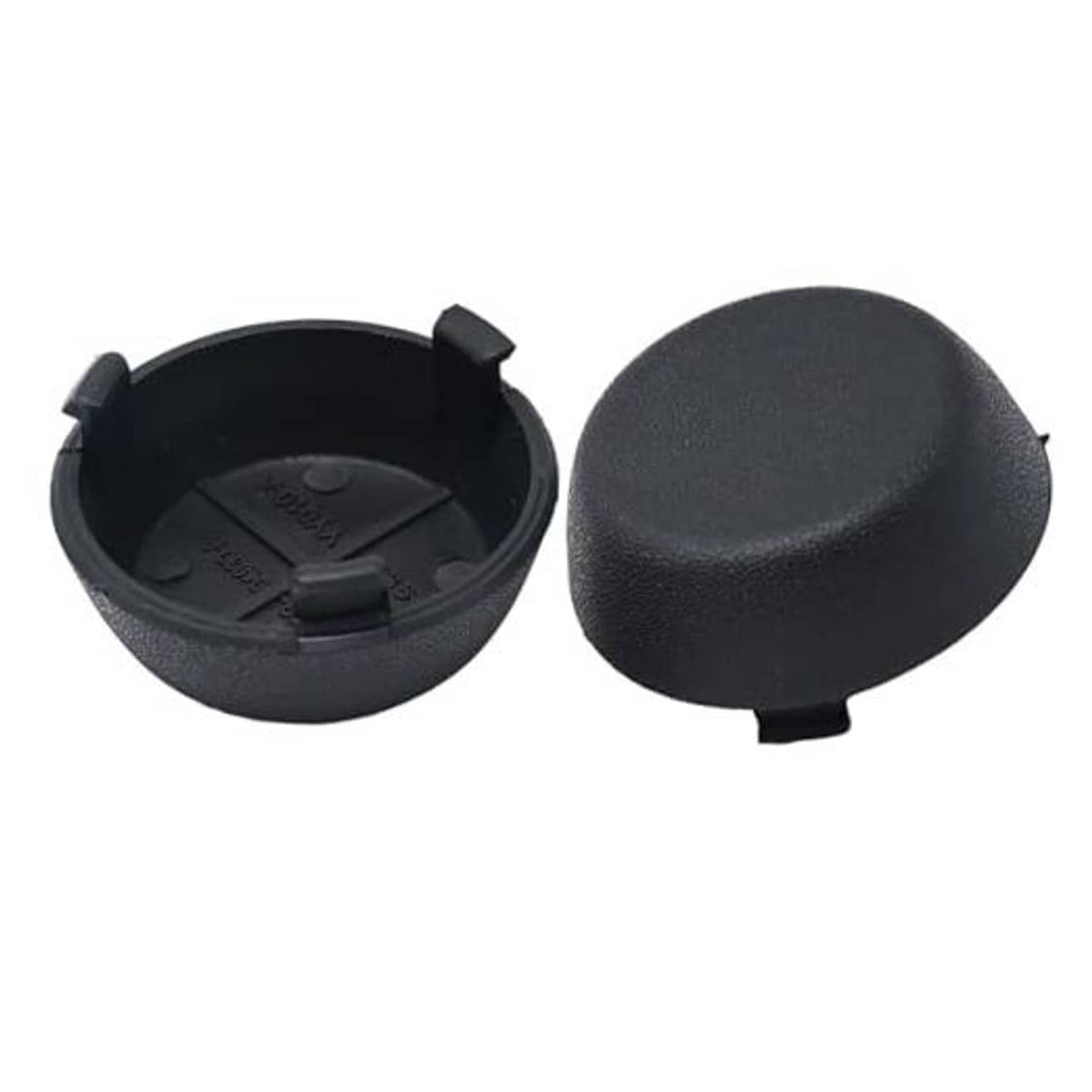 Pair of black rear bumper dome caps, shown with one cap open for fitment clips