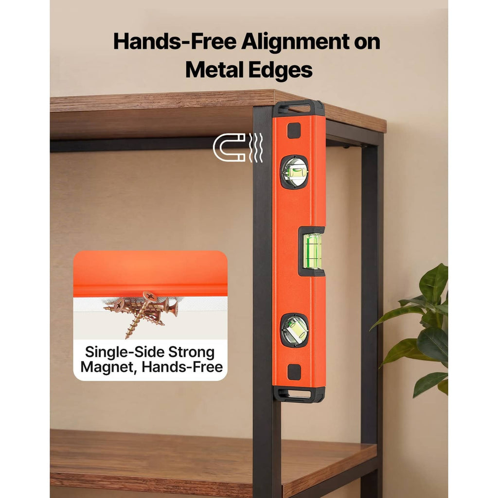 Orange magnetic torpedo level aligning on a metal edge with visible vials