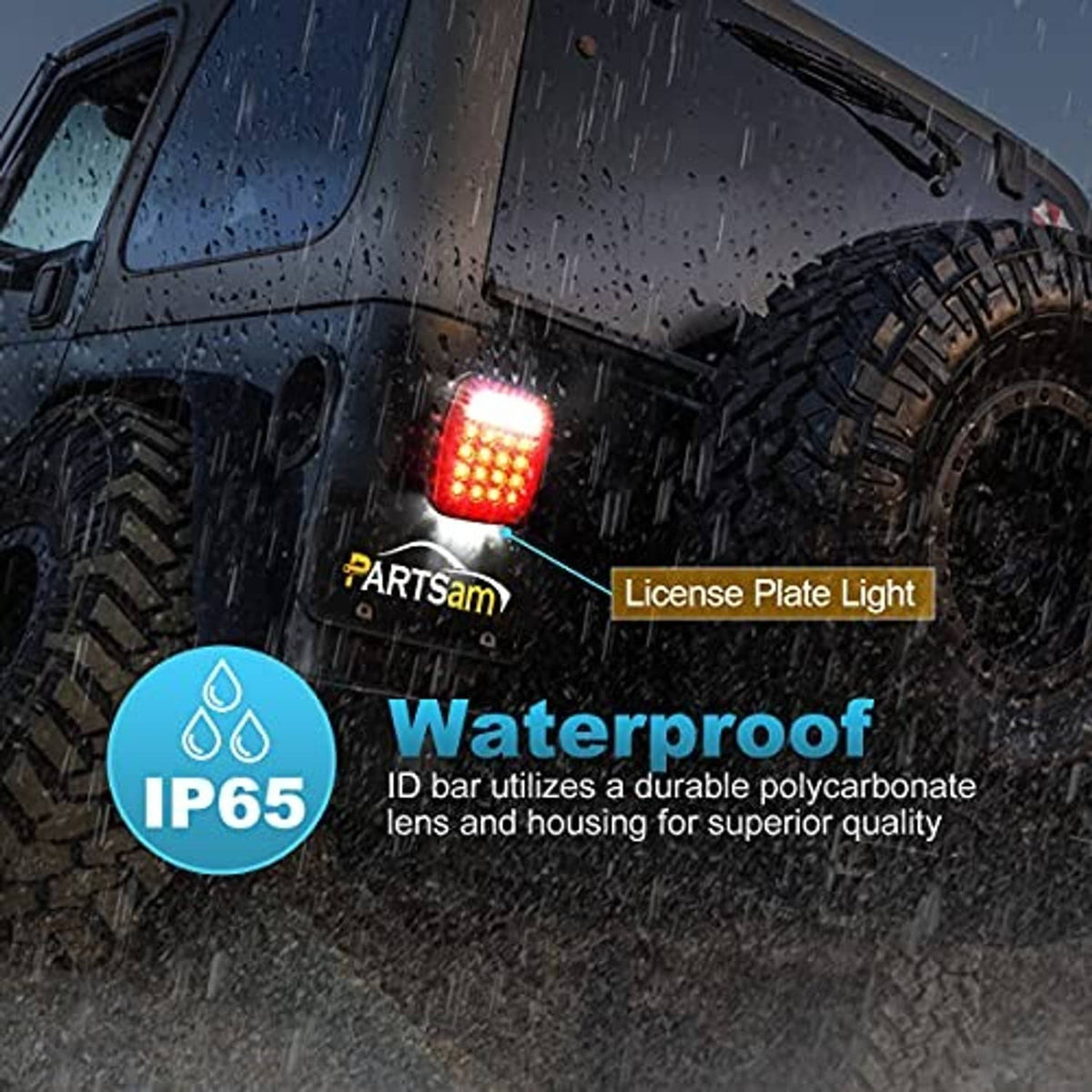 Red LED license plate light glowing on vehicle body in wet conditions