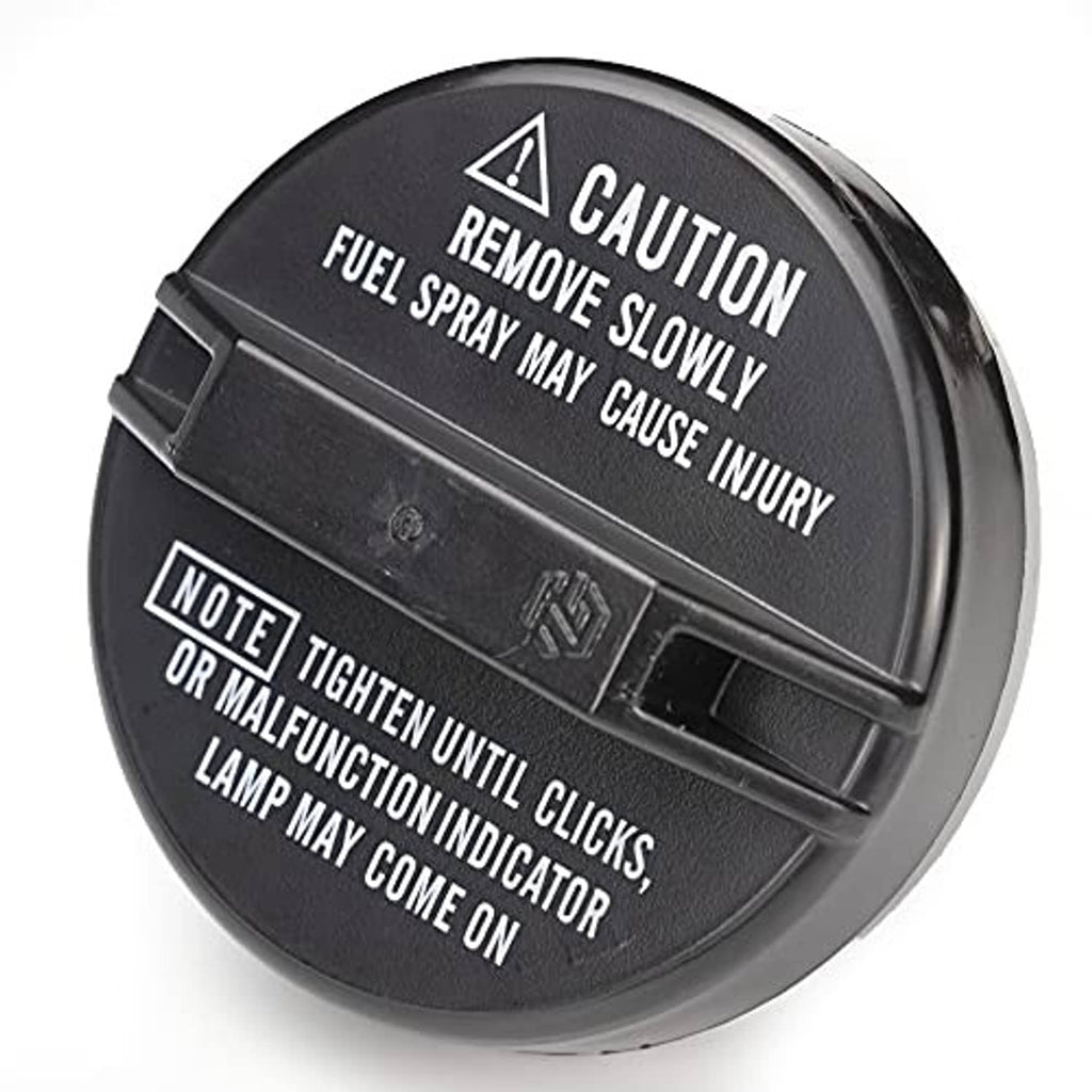 Fuel cap, angled view of black circular cover with caution and fuel spray warning text