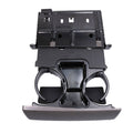 Gray dashboard ashtray and cup holder console insert with twin cup rings and opening