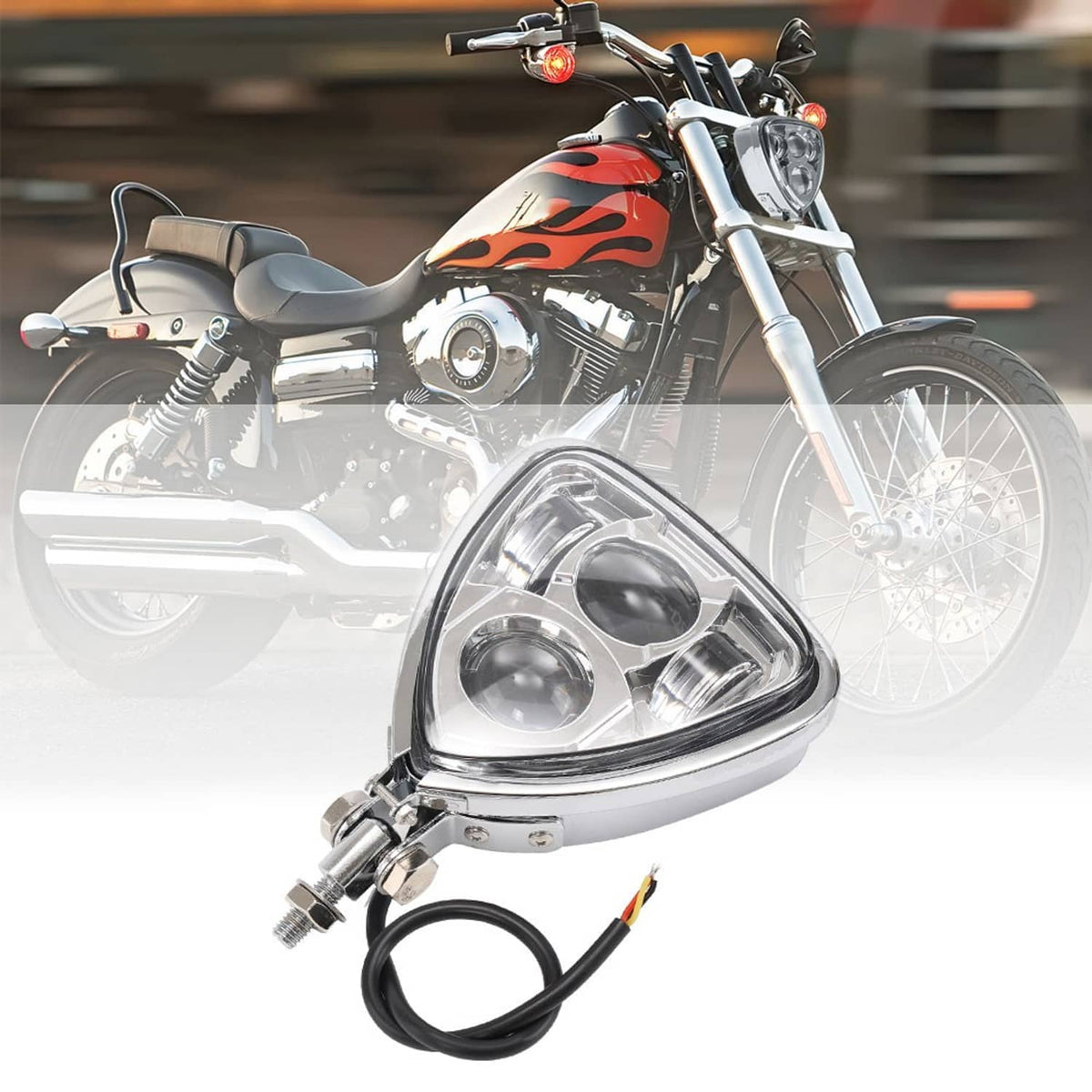Triangular LED headlight assembly with chrome housing and black cable, shown near a motorcycle
