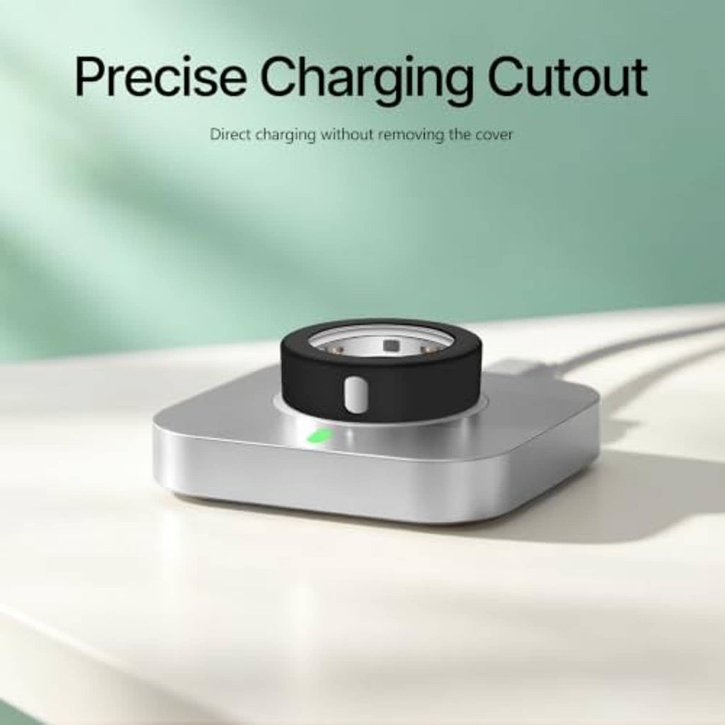Black silicone ring cover with an exposed charging cutout on a gray base