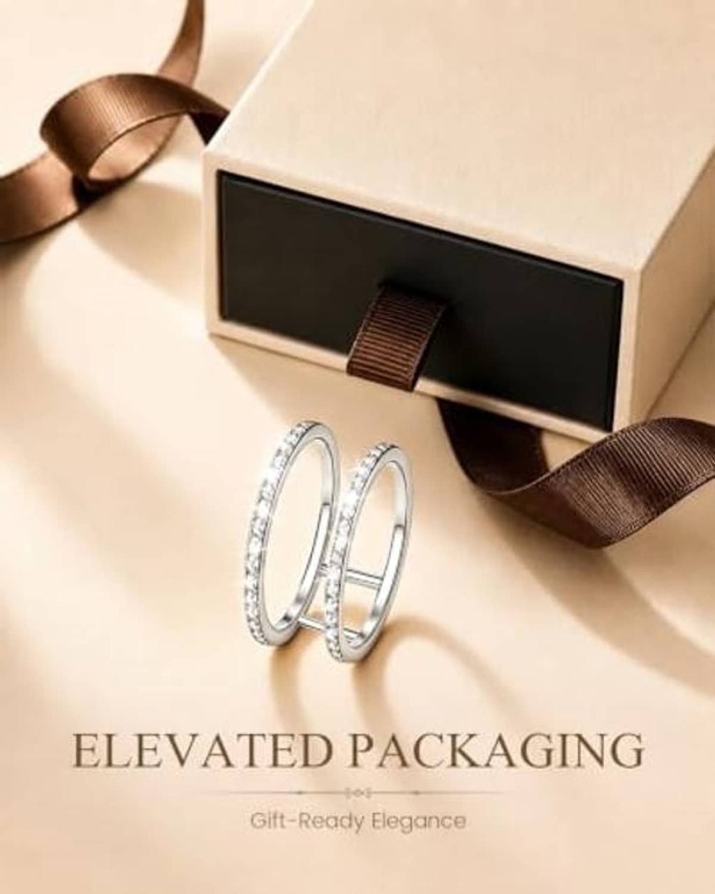 Silver ring jacket with pavé accents, shown in gift box packaging