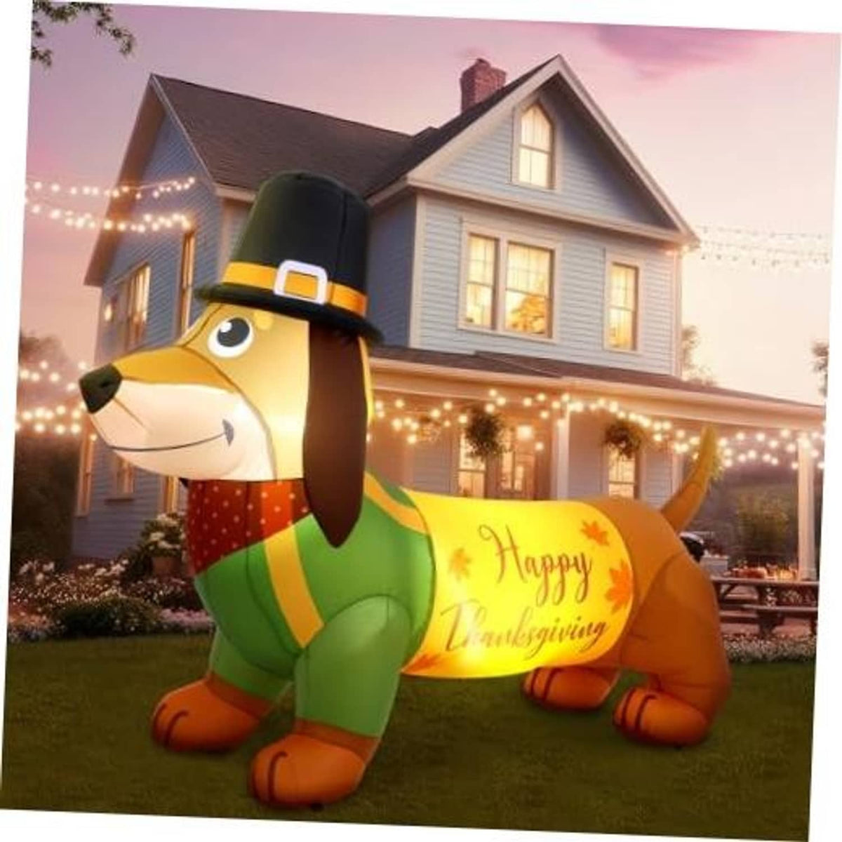 Inflatable dachshund Thanksgiving decoration with black top hat, green vest, and yellow scroll