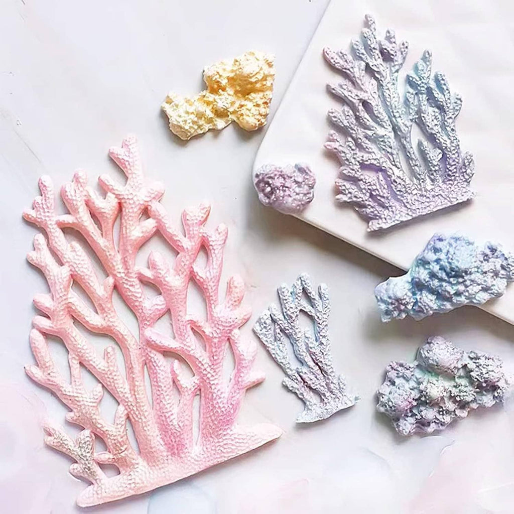 Marine-themed silicone mold set with pink, blue, purple seaweed, fish, coral, and turtle shapes