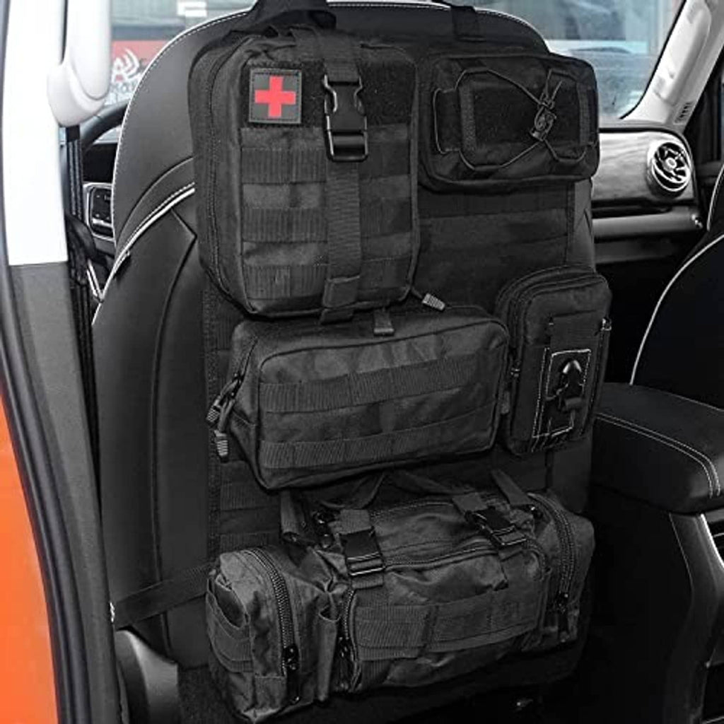 Black tactical seat back organizer with multiple pouches and red cross patch
