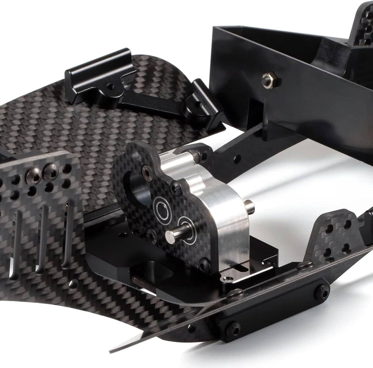 Ultralight tiny gearbox mounted on carbon fiber frame with drivetrain parts
