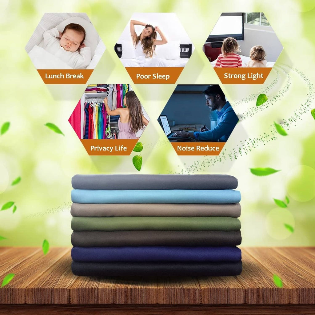 Stack of folded grey blackout curtains for sliding doors