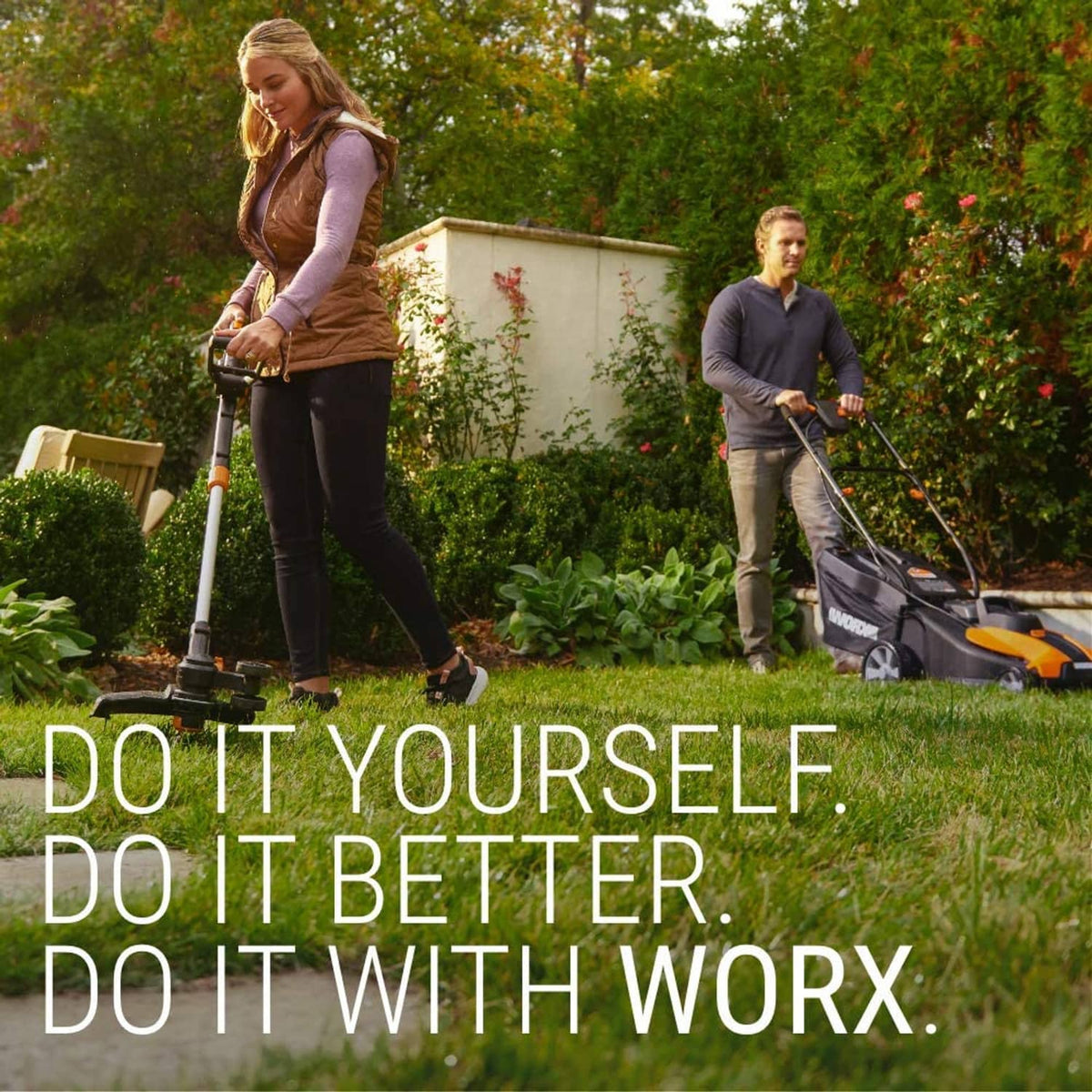 Orange and black corded lawn edger/trencher being used on a grassy yard