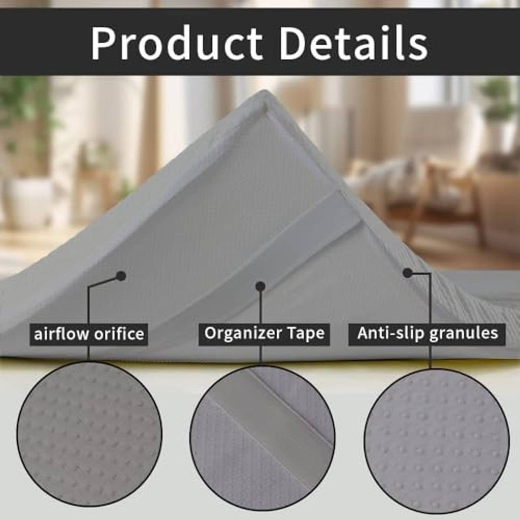 Grey massage table topper with textured fabric cover and anti-slip granule pattern