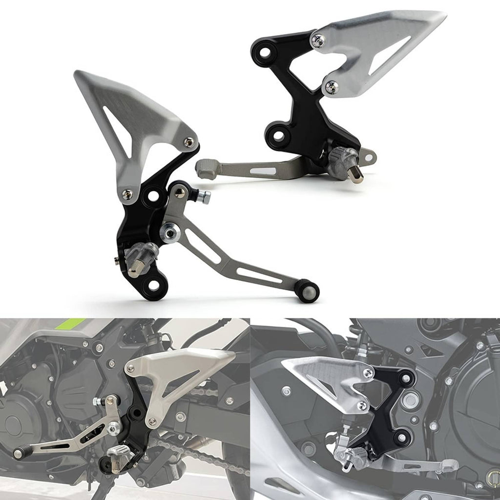Pair of motorcycle foot peg brackets with silver plates, black frames, and textured pegs
