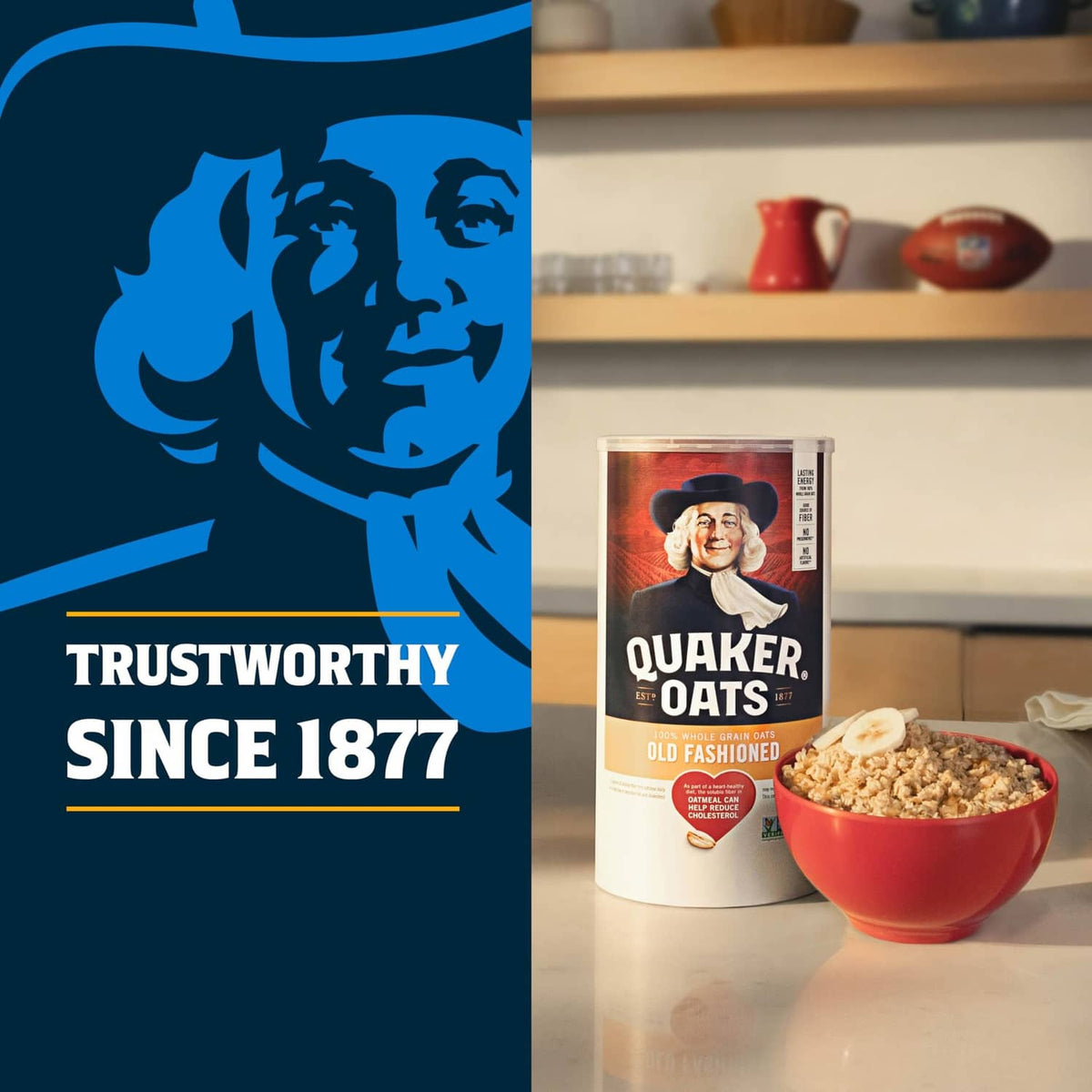 Quaker oats box standing on a kitchen counter with a red bowl of oatmeal