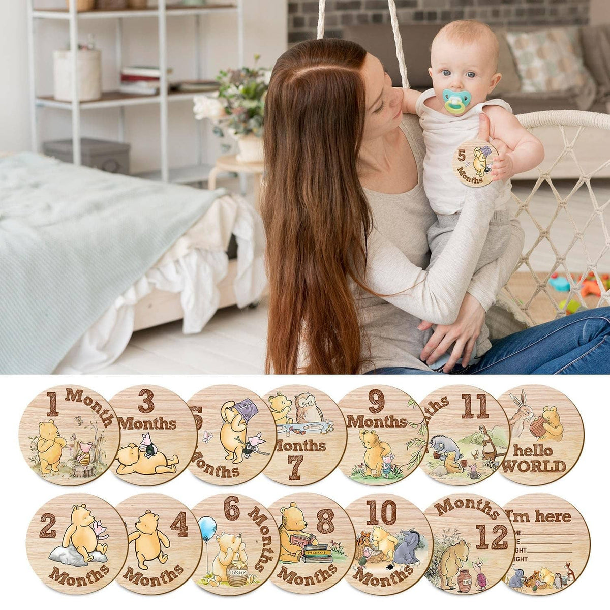 Wooden milestone circle sign set featuring months 1–12, shown with baby in arms.