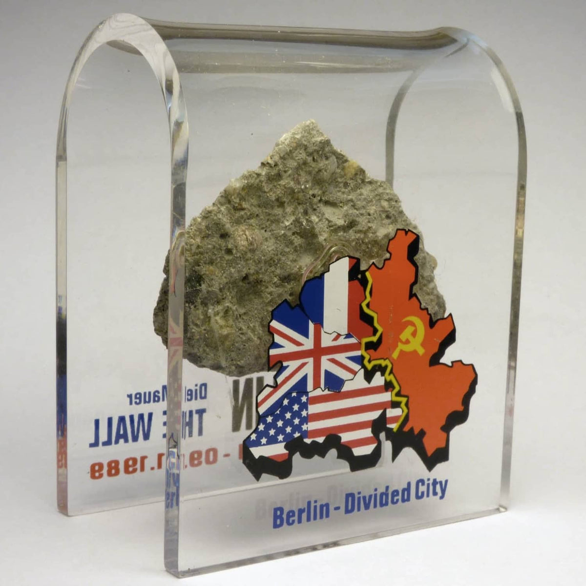 Acrylic display case with Berlin Wall rock and Berlin-Divided City map flags, front view