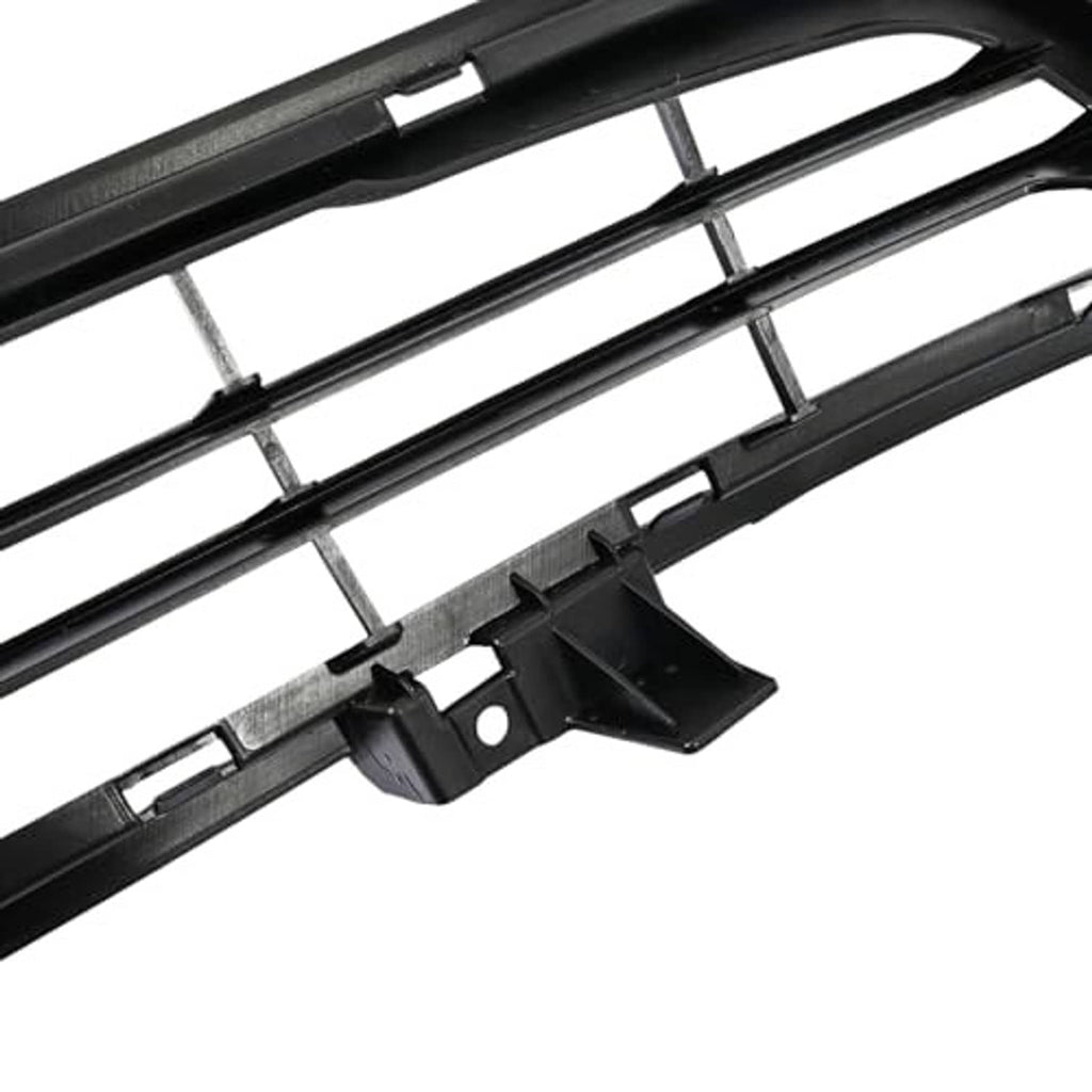 Close-up of black grille mounting clips and tabs on slat frame
