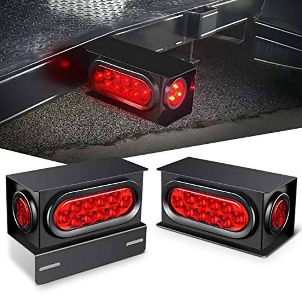 Pair of black trailer light boxes with red oval LEDs and round red marker lenses