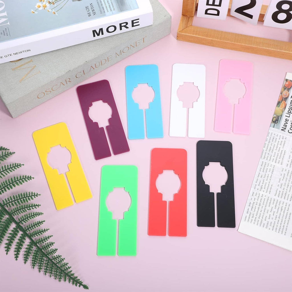 Set of colorful hanging closet dividers with cutout silhouettes arranged in rows