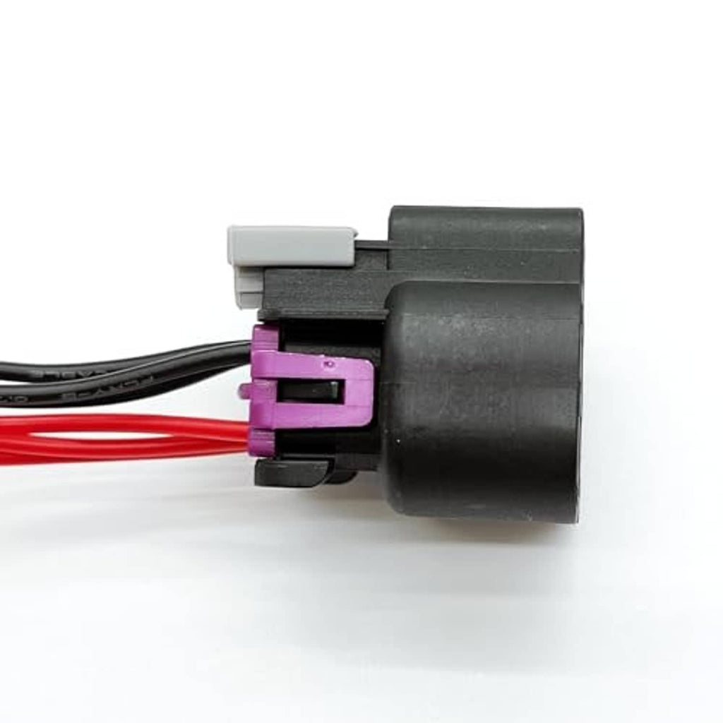 Throttle body connector pigtail with black/red wires and purple insert, side view