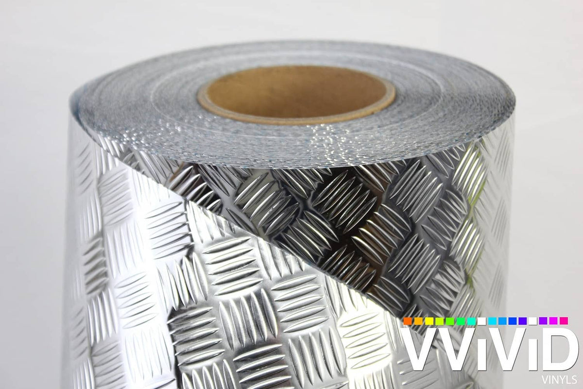 Diamond-plate metallic chrome vinyl wrap roll with embossed diamond plate pattern