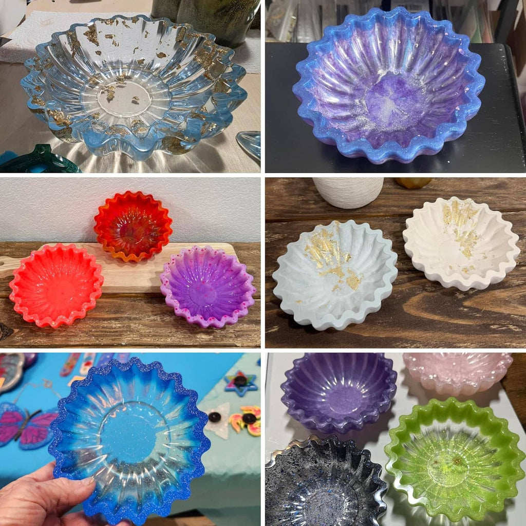 Set of scalloped resin bowls in blue, purple, red, white, green, and black