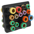 Truck air manifold connector block with multicolor fittings on black housing