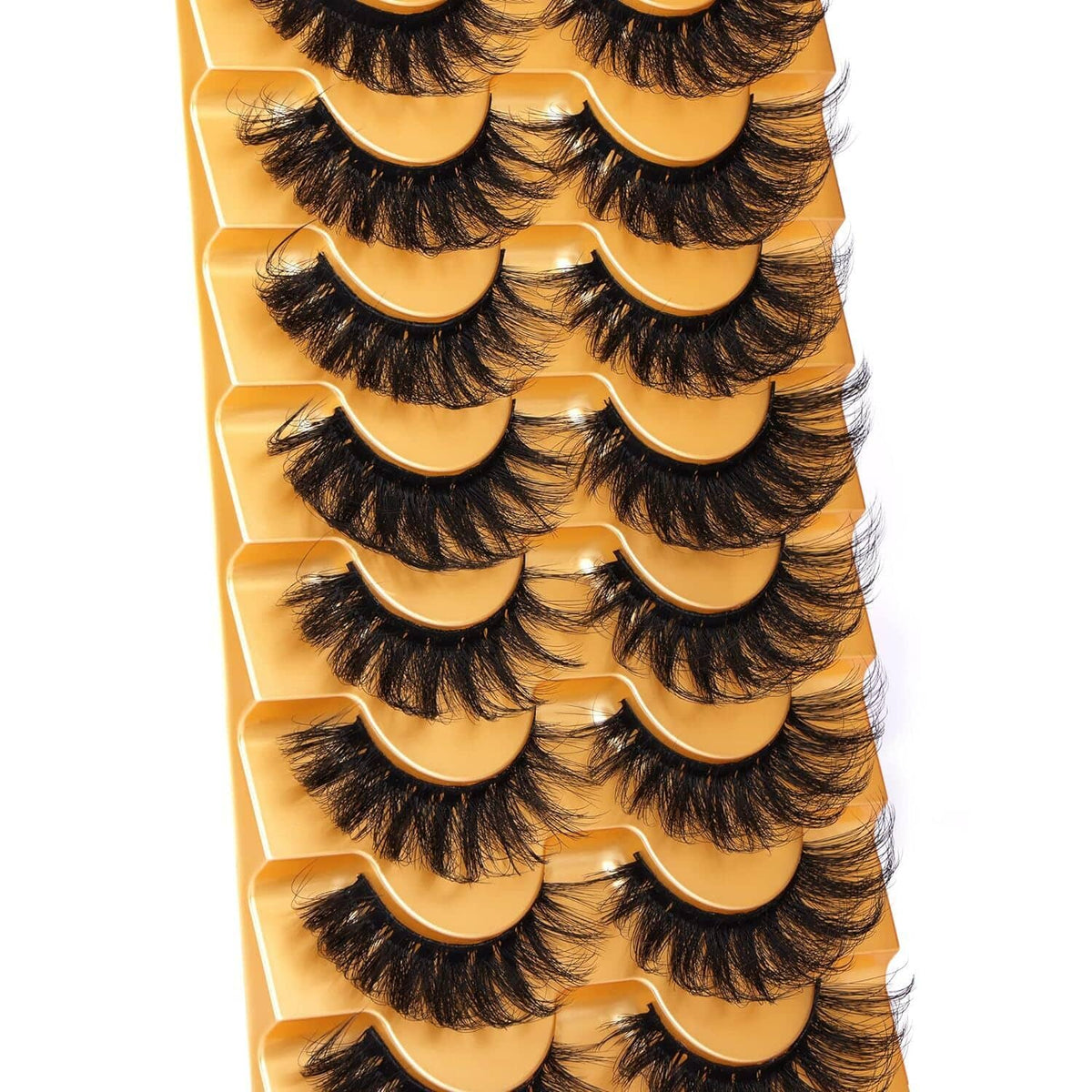 Stacked view of fluffy curled false eyelashes, dark lashes with golden band bases