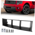 Black front lower bumper grille trim panel with three rectangular openings and screws