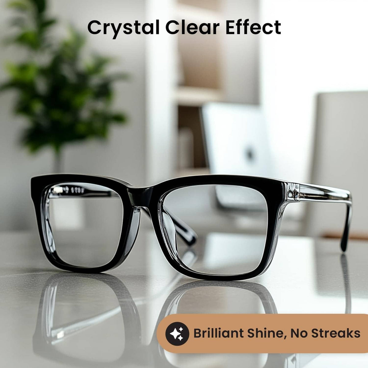 Black eyeglasses with clear, reflective lenses on a table