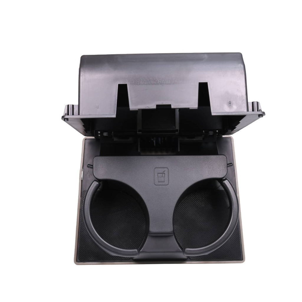 Dashboard cup holder with two round cup openings, stone gray lid and center divider