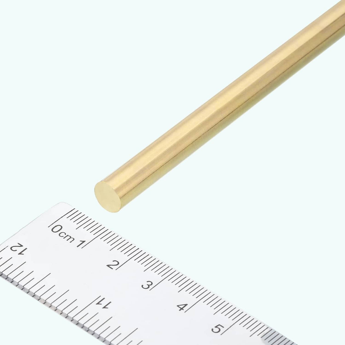Brass round rod stock with ruler scale reference, 4mm diameter, 305mm long