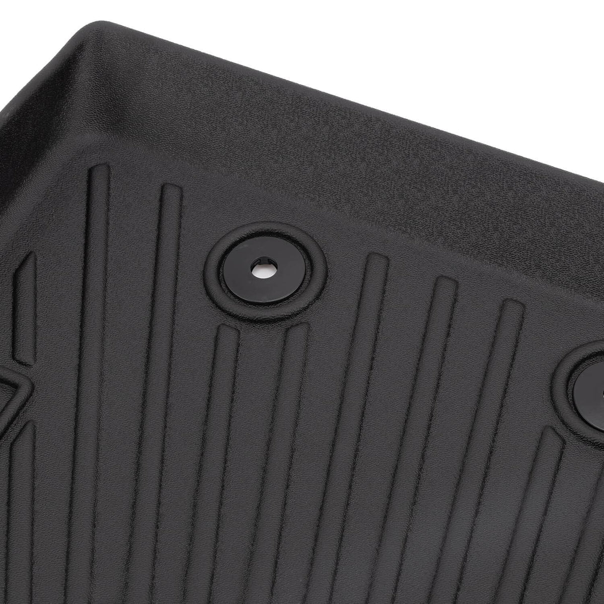 Black TPE floor mat with raised channels and round mounting hole