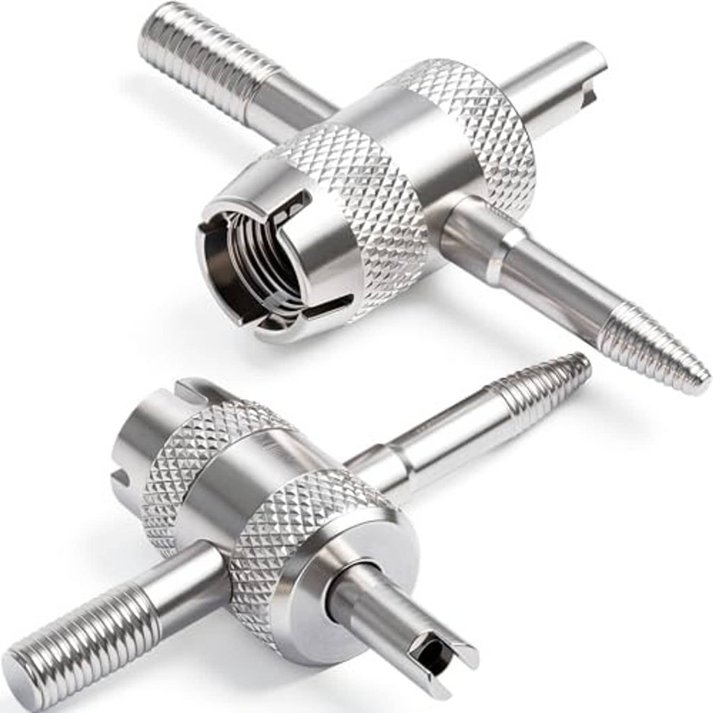 Two silver tire valve core tools with knurled grips